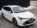 Toyota Corolla TS 1.8 Hybrid Executive 122pk Dodehoek | HUD, Auto's, Toyota, 1345 kg, Wit, Stationwagon, 1798 cc