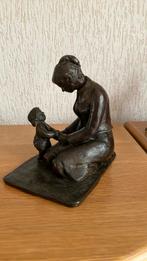 Bronzen beeld moeder en kind, Ophalen