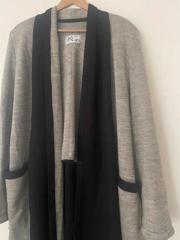 Damesvest (beige-zwart) beschikbaar voor biedingen