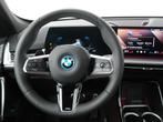 BMW iX1 eDrive20 67 kWh | M Sport Pro | Travel Pack | Comfor, Auto's, BMW, 750 kg, Met garantie (alle), Blauw, 204 pk
