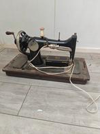 Antieke Phoenix Naaimachine, Ophalen