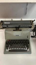 Oude olivetti typemachine, Ophalen