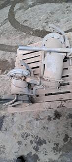 Nieuwe Ducker klepels en gebruikte mestafsluiters, Ophalen