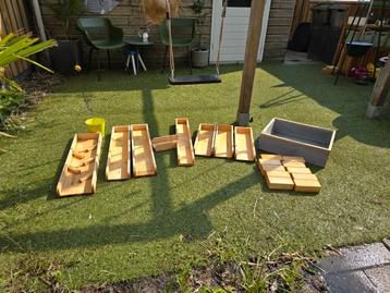 Muddy buddy houten waterbaan. beschikbaar voor biedingen