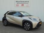 Toyota Aygo X 1.0 VVT-i AUTOMAAT PULSE CAMERA CARPLAY ENZ..., Stof, Gebruikt, Bruin, 4 stoelen