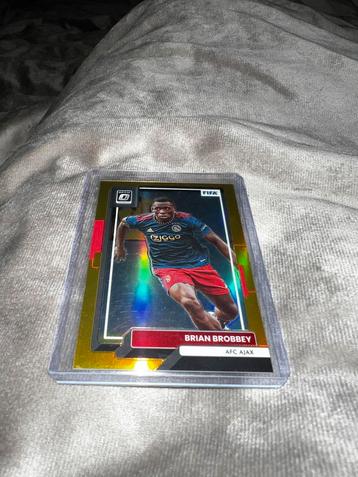 Panini Select 22/23 – Brian Brobbey Gold Optic /10 – Ajax beschikbaar voor biedingen