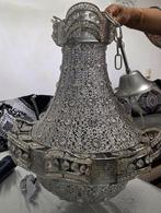 Zilveren kroonluchter met kristallen, Ophalen