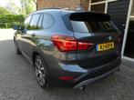 BMW X1 XDrive20i M Sport Automaat / Panoramdak / Head Up, Auto's, 1998 cc, Stof, Gebruikt, 2000 kg