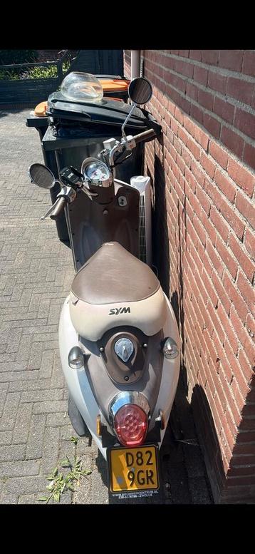 Sym Mio Bromscooter - Goed Onderhouden! beschikbaar voor biedingen