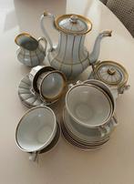 Servies wit met goud, Ophalen