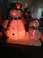 Kerst sneeuwpop met licht, Ophalen