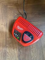 Milwaukee M12 12V 2.0ah red lithium accu met acculader nieuw, Ophalen, Zo goed als nieuw