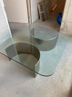 design glazen salontafel met rvs ovale steunen, Huis en Inrichting, Tafels | Salontafels, Ophalen, Gebruikt, 100 tot 150 cm, Vierkant