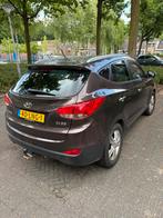 Hyundai iX35 2.0 I Cvvt 2WD AUT 2010 Bruin, 1998 cc, 74 €/maand, Zwart, Bruin