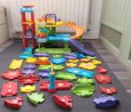 VTech garage met extra onderdelen en 3 auto's, Kinderen en Baby's, Speelgoed | Vtech, Ophalen, Zo goed als nieuw, 2 tot 4 jaar