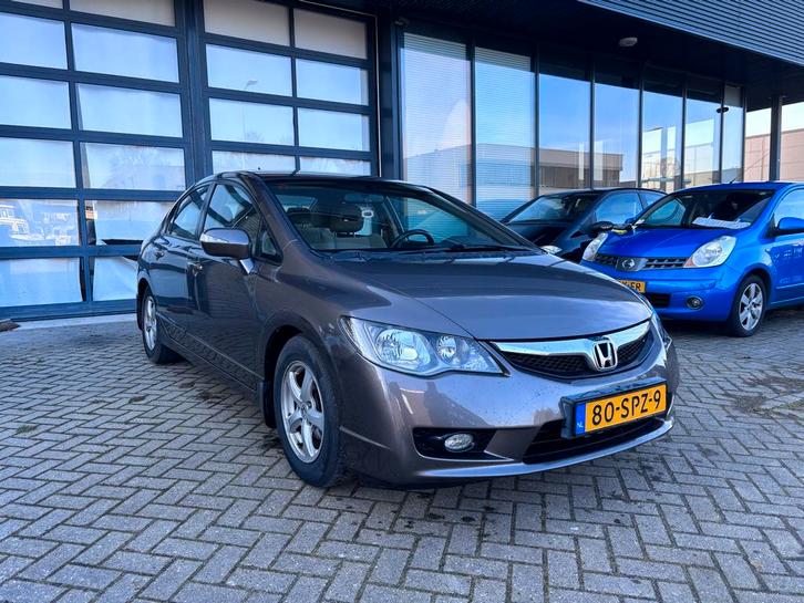 Honda Civic 1.3 Vtec Hybrid 4DR C-tr. 2011 Bruin, Auto's, Honda, Bedrijf, Civic, Hybride Elektrisch/Benzine, A, Sedan, Automaat