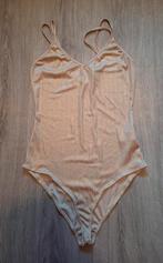 Goudkleurige body Bershka maat M, Kleding | Dames, Tops, Ophalen of Verzenden, Zo goed als nieuw, Maat 38/40 (M), Lange mouw