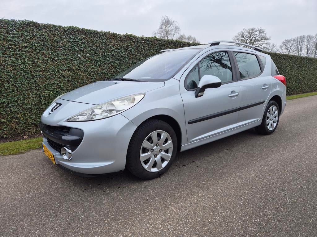 Peugeot 207 1.6 16V SW Outdoor 2008 Grijs, Auto's, Voorwielaandrijving, Stof, Zwart, 4 cilinders