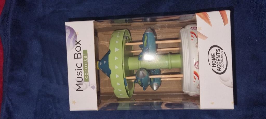 Muziekdoos carrousel met raketten, Ophalen