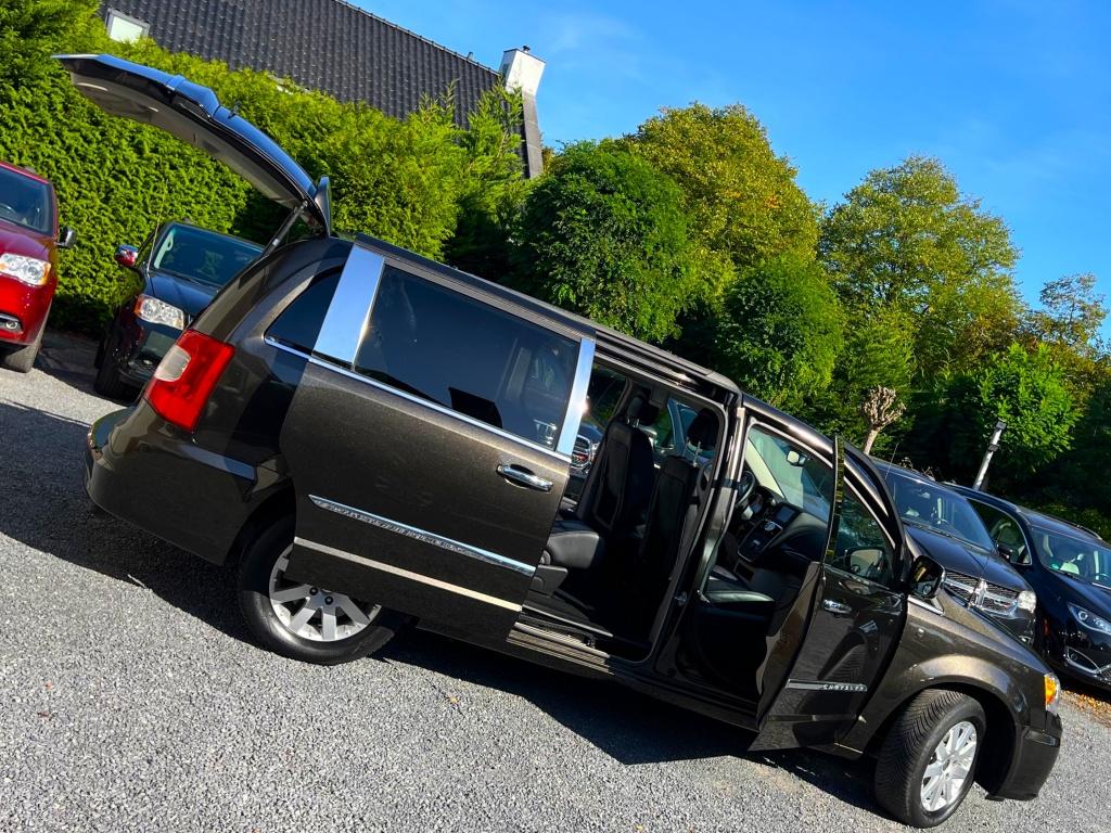 Chrysler Grand Voyager 3.6 V6 LIMITED J.DAIMLER BLACK 2xTV/D, Gebruikt, Zwart, Grand Voyager, 7 stoelen