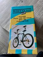 Fiets lift ophangsysteem., Ophalen