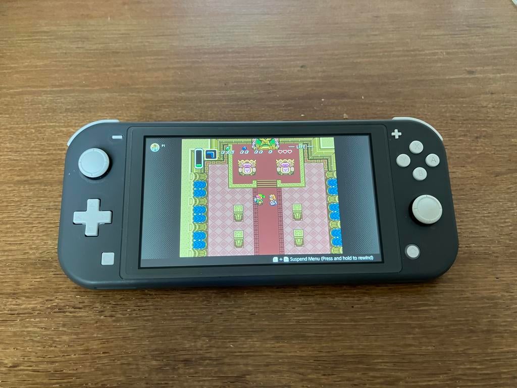 Nintendo Switch Lite - Als nieuw en met extra’s, Ophalen, Grijs, Gebruikt, Met beschermhoes of tas