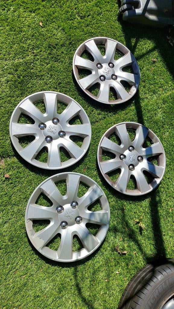 Set van 4 Peugeot wieldoppen voor 15" velgen, Ophalen of Verzenden, Gebruikt
