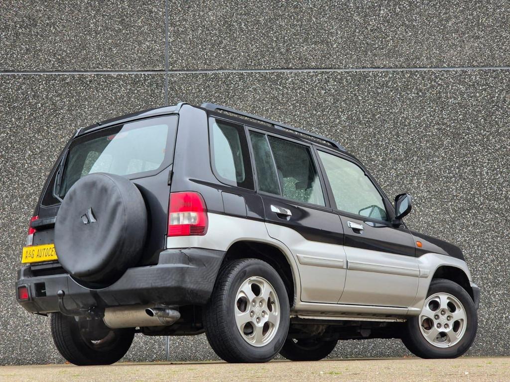 Mitsubishi Pajero Pinin 2.0 4x4/Airco/129PK/Trekhaak/Nw Apk, Stof, Gebruikt, 4 cilinders, Zwart