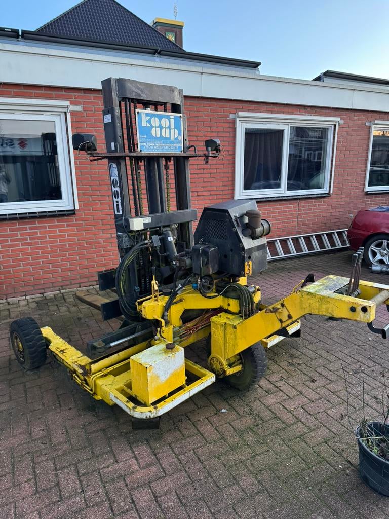 Kooiaap met wat werk, Ophalen