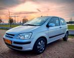 Hyundai Getz 1.3 3DRS 2004 Grijs met Airco & Stuurbekr., Auto's, Voorwielaandrijving, 4 cilinders, Origineel Nederlands, Handgeschakeld