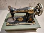 Antieke Singer Naaimachine, Ophalen