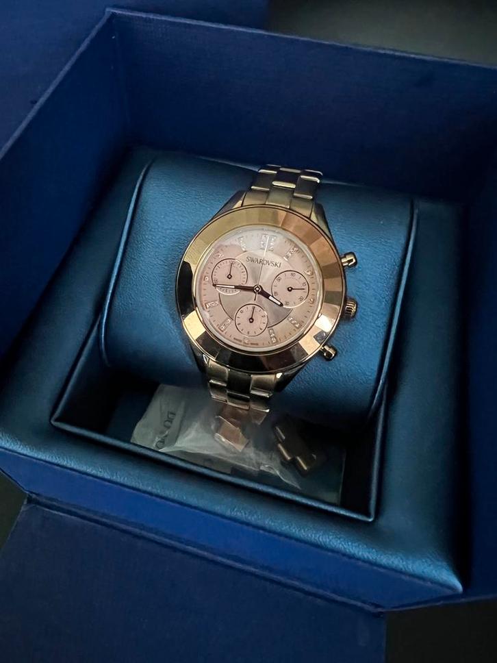Swarovski Octea Goudkleurig Horloge, Sieraden, Tassen en Uiterlijk, Horloges | Dames, Nieuw, Polshorloge, Overige merken, Overige materialen