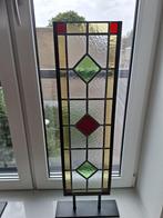 Mooie glas in lood, Ophalen