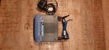 Linksys draadloze router met kabel. beschikbaar voor biedingen