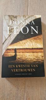 Donna Leon - Een kwestie van vertrouwen, Boeken, Thrillers, Donna Leon, Ophalen of Verzenden, Zo goed als nieuw, Nederland