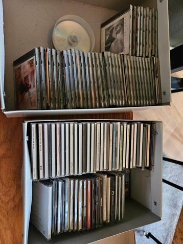 2 dozen  cd's gratis op te halen (flesje wijn mag)