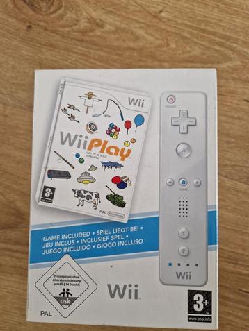wii controller (wit) met wii spellen beschikbaar voor biedingen