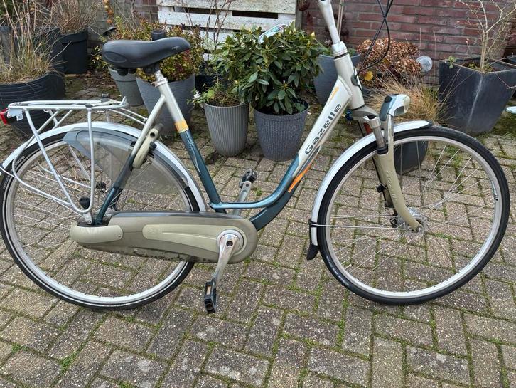 Gazelle orange damesfiets 7 nexus igst, Fietsen en Brommers, Fietsen | Dames | Damesfietsen, Zo goed als nieuw, Gazelle, Versnellingen