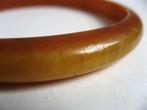 Vintage bakeliet barnsteen armband jaren 30, Sieraden, Tassen en Uiterlijk, Antieke sieraden, Ophalen of Verzenden, Overige materialen