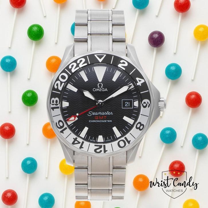 Omega Seamaster GMT 50th Ann. • 1999 • Omega service 05/2025, Sieraden, Tassen en Uiterlijk, Horloges | Heren, Gebruikt, Omega