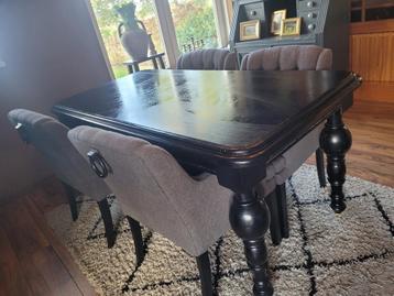 Gebruikte eettafel zwart beschikbaar voor biedingen