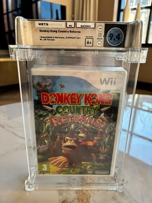 Donkey Kong Country returns WII WATA graded 9,4 A+, Spelcomputers en Games, Games | Nintendo Wii U, Nieuw, Racen en Vliegen, 3 spelers of meer