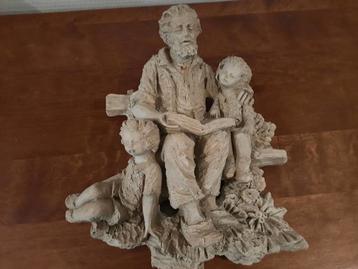 Beeld: Opa leest voor aan kleinkinderen beschikbaar voor biedingen