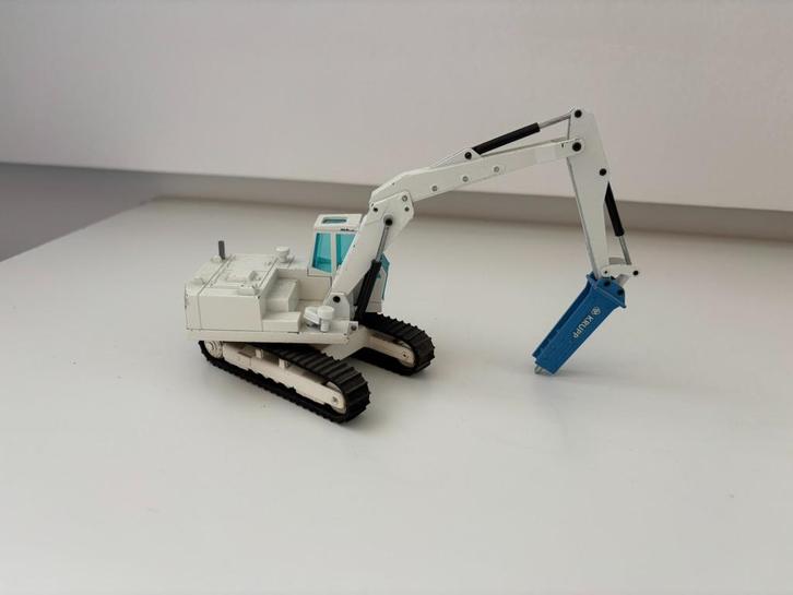 NZG Eder R835-graafmachine met Krupp-hamer 1:50, Hobby en Vrije tijd, Modelauto's | 1:50, Gebruikt, Overige typen, NZG, Ophalen of Verzenden