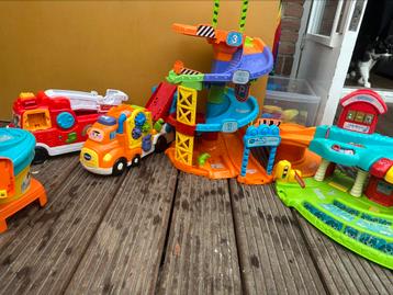 VTech Toet Toet autogarage/ baan delen/ losse auto’s beschikbaar voor biedingen