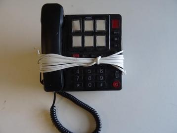 Vaste telefoon met grote knoppen, toetsen en noodknop beschikbaar voor biedingen