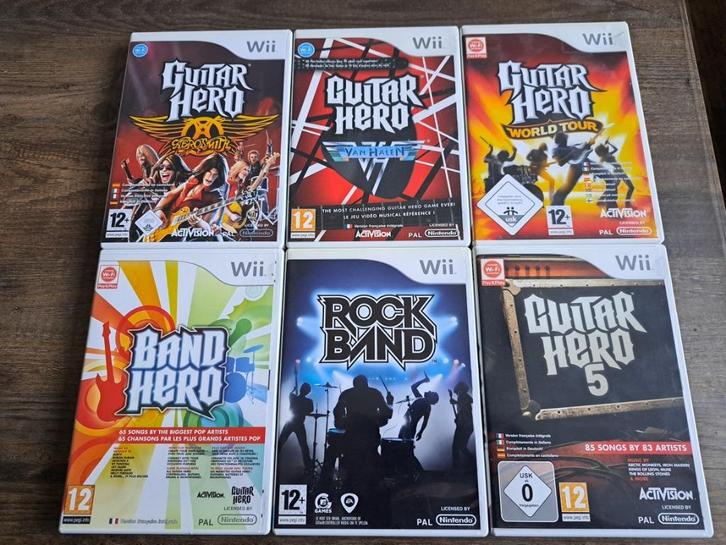 Guitar Hero en bijb. (Nintendo Wii) CIB Inc. accessoires, Spelcomputers en Games, Games | Nintendo Wii, Zo goed als nieuw, Muziek