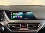 BMW 1-serie 118i Executive Pano|Navi|Carplay|PDC|Cruise|Deal, Stof, Gebruikt, Zwart, Traction-control