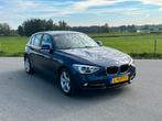 BMW 1-Serie 116I Automaat 2012 Blauw Stoelverwarming, Auto's, 4 cilinders, Blauw, 1200 kg, 650 kg