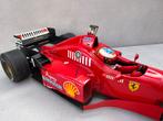 1/12 MINICHAMPS FERRARI F-310  1996, Hobby en Vrije tijd, Modelauto's | 1:5 tot 1:12, Ophalen of Verzenden, Zo goed als nieuw
